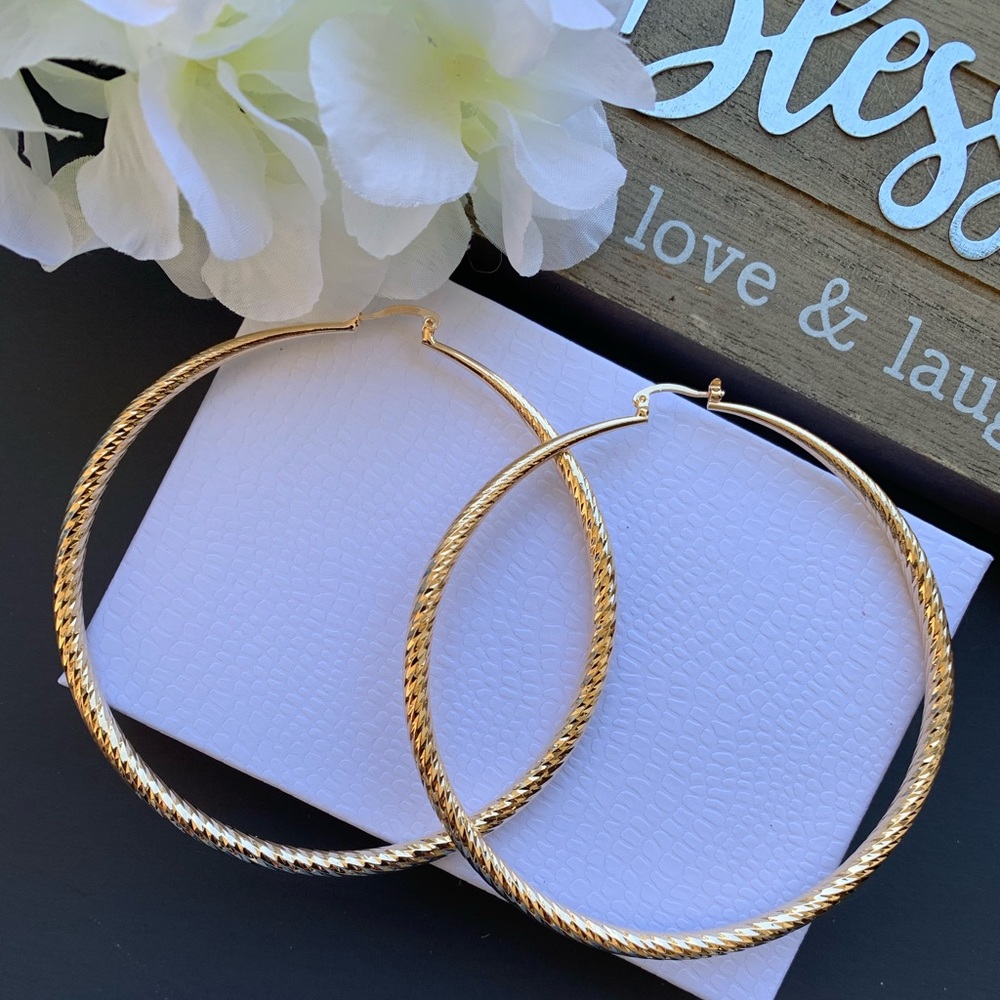 New laminate gold earing